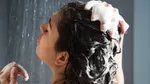 A person washing their hair